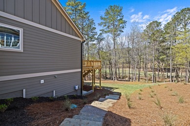 Embark on an unparalleled lifestyle in this exquisite golf-front on Harbor Club Golf and Country Club in Georgia - for sale on GolfHomes.com, golf home, golf lot