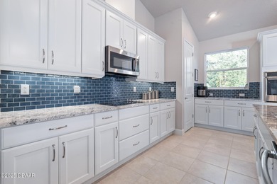 Perfectly sized and beautifully maintained, this just-under-1800 on Plantation Bay Golf and Country Club in Florida - for sale on GolfHomes.com, golf home, golf lot