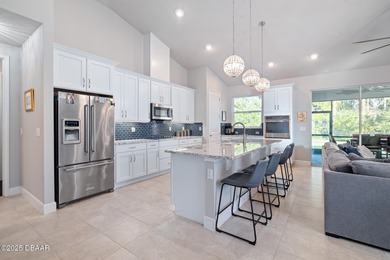 Perfectly sized and beautifully maintained, this just-under-1800 on Plantation Bay Golf and Country Club in Florida - for sale on GolfHomes.com, golf home, golf lot