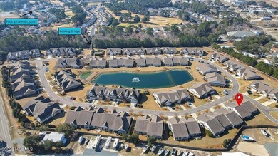 Experience coastal living in its meticulously maintained on South Harbour Golf Links in North Carolina - for sale on GolfHomes.com, golf home, golf lot