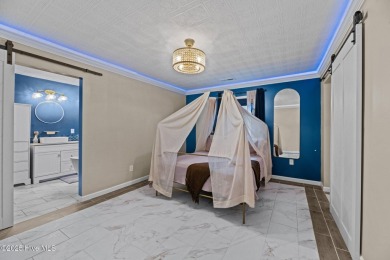 Welcome to 806 Wind Way - a hidden gem nestled in the gated on Harbour Point Golf Club in North Carolina - for sale on GolfHomes.com, golf home, golf lot