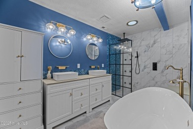 Welcome to 806 Wind Way - a hidden gem nestled in the gated on Harbour Point Golf Club in North Carolina - for sale on GolfHomes.com, golf home, golf lot