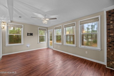 Welcome to 806 Wind Way - a hidden gem nestled in the gated on Harbour Point Golf Club in North Carolina - for sale on GolfHomes.com, golf home, golf lot