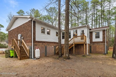 Welcome to 806 Wind Way - a hidden gem nestled in the gated on Harbour Point Golf Club in North Carolina - for sale on GolfHomes.com, golf home, golf lot