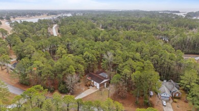 Welcome to 806 Wind Way - a hidden gem nestled in the gated on Harbour Point Golf Club in North Carolina - for sale on GolfHomes.com, golf home, golf lot