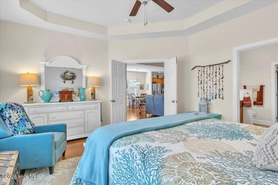 Experience coastal living in its meticulously maintained on South Harbour Golf Links in North Carolina - for sale on GolfHomes.com, golf home, golf lot