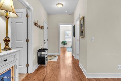 Experience coastal living in its meticulously maintained on South Harbour Golf Links in North Carolina - for sale on GolfHomes.com, golf home, golf lot