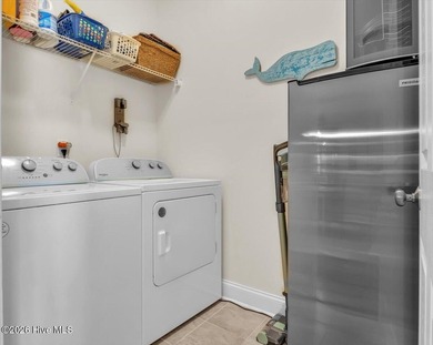 Experience coastal living in its meticulously maintained on South Harbour Golf Links in North Carolina - for sale on GolfHomes.com, golf home, golf lot