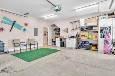 Experience coastal living in its meticulously maintained on South Harbour Golf Links in North Carolina - for sale on GolfHomes.com, golf home, golf lot