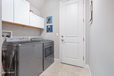 Perfectly sized and beautifully maintained, this just-under-1800 on Plantation Bay Golf and Country Club in Florida - for sale on GolfHomes.com, golf home, golf lot