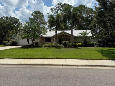Rare FOUR-bedroom, corner lot home in the ever-desired Tarpon on Tarpon Woods Golf Club in Florida - for sale on GolfHomes.com, golf home, golf lot