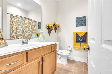 Experience coastal living in its meticulously maintained on South Harbour Golf Links in North Carolina - for sale on GolfHomes.com, golf home, golf lot