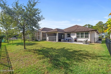 Perfectly sized and beautifully maintained, this just-under-1800 on Plantation Bay Golf and Country Club in Florida - for sale on GolfHomes.com, golf home, golf lot
