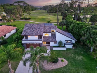 Experience the epitome of modern living in this stunning on The Grand Club - Pine Lakes Course in Florida - for sale on GolfHomes.com, golf home, golf lot