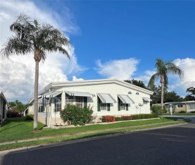 Exceptional Triple-Wide Home on Corner Lot in Pet-Friendly on Fairway Village Golf Course in Florida - for sale on GolfHomes.com, golf home, golf lot