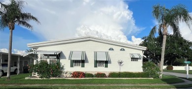 Exceptional Triple-Wide Home on Corner Lot in Pet-Friendly on Fairway Village Golf Course in Florida - for sale on GolfHomes.com, golf home, golf lot