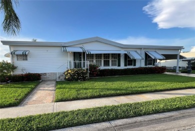 Exceptional Triple-Wide Home on Corner Lot in Pet-Friendly on Fairway Village Golf Course in Florida - for sale on GolfHomes.com, golf home, golf lot
