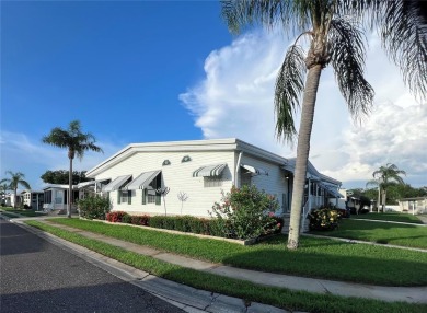 Exceptional Triple-Wide Home on Corner Lot in Pet-Friendly on Fairway Village Golf Course in Florida - for sale on GolfHomes.com, golf home, golf lot