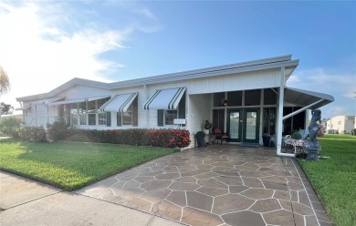 Exceptional Triple-Wide Home on Corner Lot in Pet-Friendly on Fairway Village Golf Course in Florida - for sale on GolfHomes.com, golf home, golf lot