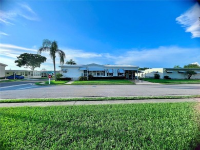 Exceptional Triple-Wide Home on Corner Lot in Pet-Friendly on Fairway Village Golf Course in Florida - for sale on GolfHomes.com, golf home, golf lot