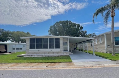 Welcome Home to Comfort, Community, and Connection. Tucked into on Fairway Village Golf Course in Florida - for sale on GolfHomes.com, golf home, golf lot