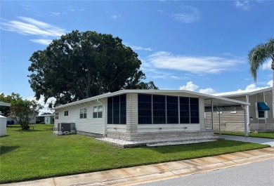Welcome Home to Comfort, Community, and Connection. Tucked into on Fairway Village Golf Course in Florida - for sale on GolfHomes.com, golf home, golf lot