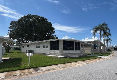 Welcome Home to Comfort, Community, and Connection. Tucked into on Fairway Village Golf Course in Florida - for sale on GolfHomes.com, golf home, golf lot