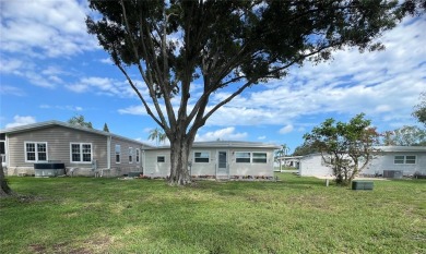 Welcome Home to Comfort, Community, and Connection. Tucked into on Fairway Village Golf Course in Florida - for sale on GolfHomes.com, golf home, golf lot