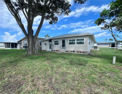 Welcome Home to Comfort, Community, and Connection. Tucked into on Fairway Village Golf Course in Florida - for sale on GolfHomes.com, golf home, golf lot