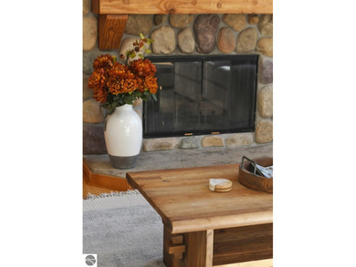 Welcome to this stunning home! Chimney Ridge 8 is situated along on Mountain Flowers Golf Course in Michigan - for sale on GolfHomes.com, golf home, golf lot