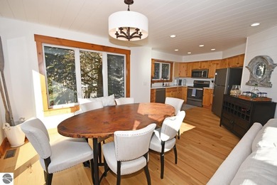 Welcome to this stunning home! Chimney Ridge 8 is situated along on Mountain Flowers Golf Course in Michigan - for sale on GolfHomes.com, golf home, golf lot