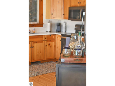 Welcome to this stunning home! Chimney Ridge 8 is situated along on Mountain Flowers Golf Course in Michigan - for sale on GolfHomes.com, golf home, golf lot