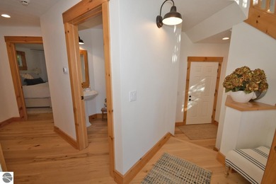 Welcome to this stunning home! Chimney Ridge 8 is situated along on Mountain Flowers Golf Course in Michigan - for sale on GolfHomes.com, golf home, golf lot