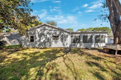 Discover this stunning 3-bedroom, 2-bathroom home with a 2-car on Heather Golf and Country Club in Florida - for sale on GolfHomes.com, golf home, golf lot