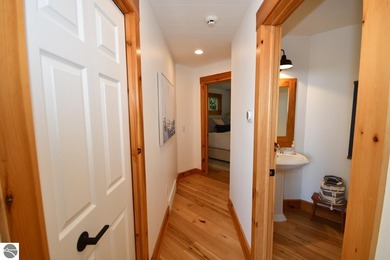 Welcome to this stunning home! Chimney Ridge 8 is situated along on Mountain Flowers Golf Course in Michigan - for sale on GolfHomes.com, golf home, golf lot