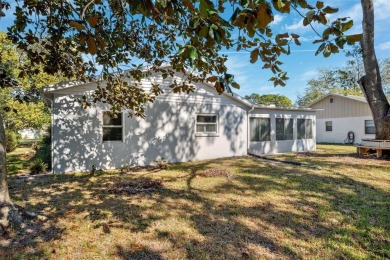 Discover this stunning 3-bedroom, 2-bathroom home with a 2-car on Heather Golf and Country Club in Florida - for sale on GolfHomes.com, golf home, golf lot