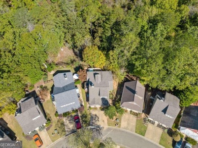 Lakeview Cottage Retreat on Wooded Lot Overlooking a Flowing on The Highlands Course at Lake Arrowhead in Georgia - for sale on GolfHomes.com, golf home, golf lot