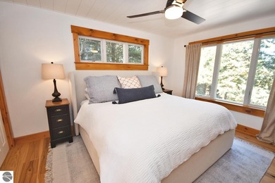 Welcome to this stunning home! Chimney Ridge 8 is situated along on Mountain Flowers Golf Course in Michigan - for sale on GolfHomes.com, golf home, golf lot