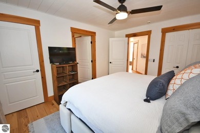 Welcome to this stunning home! Chimney Ridge 8 is situated along on Mountain Flowers Golf Course in Michigan - for sale on GolfHomes.com, golf home, golf lot