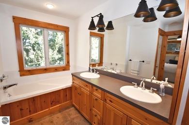 Welcome to this stunning home! Chimney Ridge 8 is situated along on Mountain Flowers Golf Course in Michigan - for sale on GolfHomes.com, golf home, golf lot