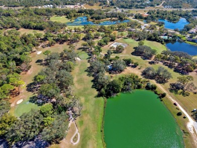 Discover this stunning 3-bedroom, 2-bathroom home with a 2-car on Heather Golf and Country Club in Florida - for sale on GolfHomes.com, golf home, golf lot