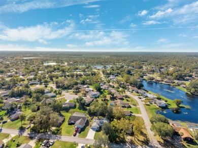 Discover this stunning 3-bedroom, 2-bathroom home with a 2-car on Heather Golf and Country Club in Florida - for sale on GolfHomes.com, golf home, golf lot