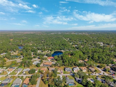 Discover this stunning 3-bedroom, 2-bathroom home with a 2-car on Heather Golf and Country Club in Florida - for sale on GolfHomes.com, golf home, golf lot