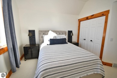 Welcome to this stunning home! Chimney Ridge 8 is situated along on Mountain Flowers Golf Course in Michigan - for sale on GolfHomes.com, golf home, golf lot