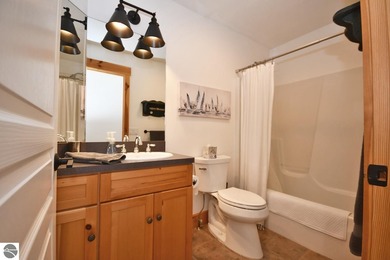 Welcome to this stunning home! Chimney Ridge 8 is situated along on Mountain Flowers Golf Course in Michigan - for sale on GolfHomes.com, golf home, golf lot