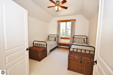 Welcome to this stunning home! Chimney Ridge 8 is situated along on Mountain Flowers Golf Course in Michigan - for sale on GolfHomes.com, golf home, golf lot