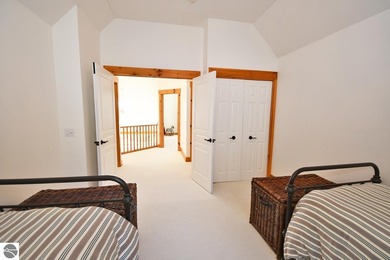 Welcome to this stunning home! Chimney Ridge 8 is situated along on Mountain Flowers Golf Course in Michigan - for sale on GolfHomes.com, golf home, golf lot