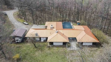This unique 3900 sq foot resort- like residence is located on a on The Chief Golf Course in Michigan - for sale on GolfHomes.com, golf home, golf lot
