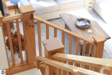 Welcome to this stunning home! Chimney Ridge 8 is situated along on Mountain Flowers Golf Course in Michigan - for sale on GolfHomes.com, golf home, golf lot