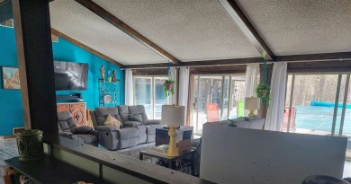 This unique 3900 sq foot resort- like residence is located on a on The Chief Golf Course in Michigan - for sale on GolfHomes.com, golf home, golf lot